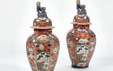 A pair of Imari porcelain covered urns