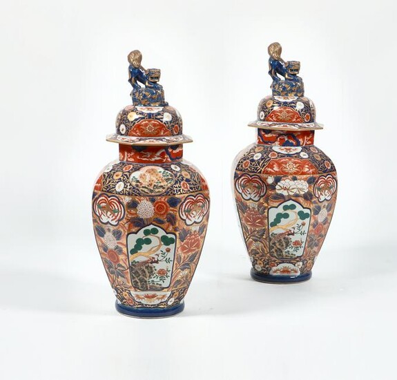 A pair of Imari porcelain covered urns