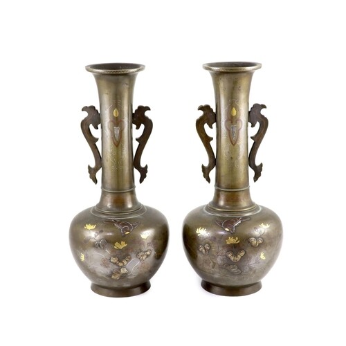 A pair of Japanese bronze and mixed metal bottle vases, Meij...