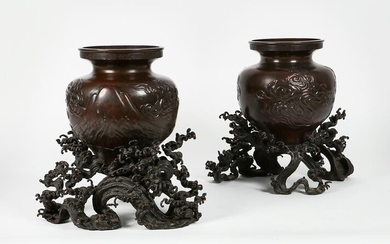 A pair of Japanese patinated bronze vases
