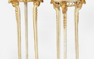 A pair of Regency-style carved giltwood plant stands