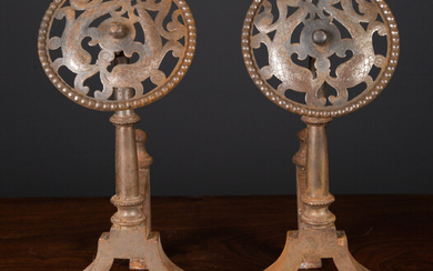 A pair of Victorian arts and crafts steel andirons