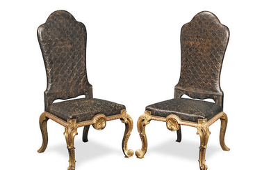 A pair of carved giltwood and gesso chairs