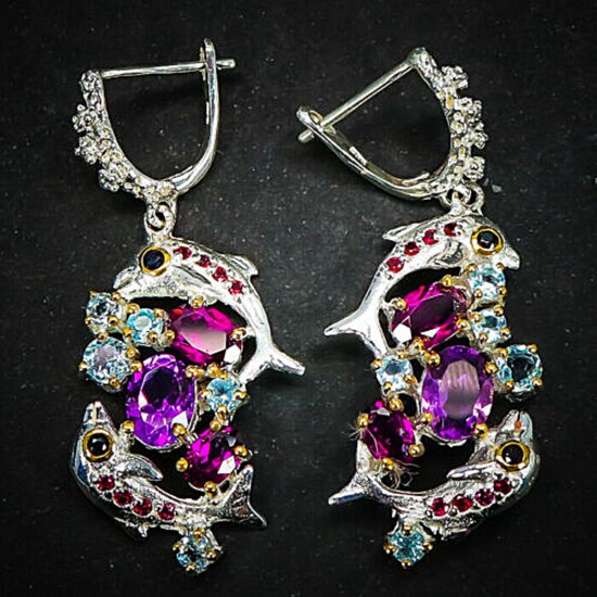 A pair of ear pendants each set with numerous oval and circular-cut amethysts, spinels, topazes and rhodolite garnets, mounted in rhodium plated sterling silver