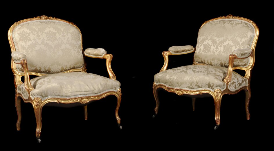 A pair of giltwood and upholstered fauteuils in Louis XV style