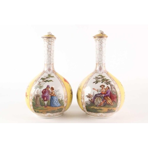 A pair of late 19th century Meissen bottle vases and covers ...