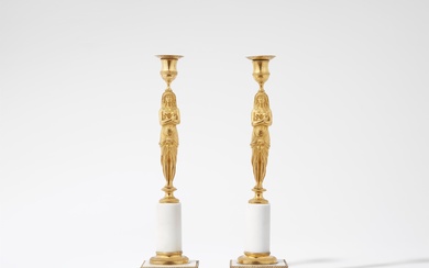 A pair of ormolu "retour d'égypte" candlesticks