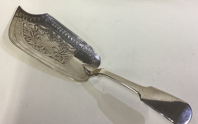 A rare Victorian silver fish slice with engraved fish decoration.