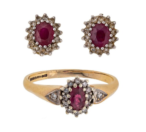A ruby and diamond ring and pair of ear studs, cluster design each centring on an oval mixed-cut ruby within a surround of brilliant-cut diamonds, ring size O, post fittings