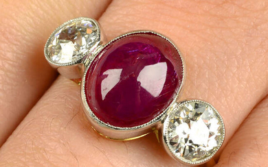 A ruby cabochon and old-cut diamond three-stone ring.