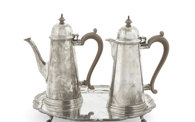 A set of English sterling silver coffee and milk pots