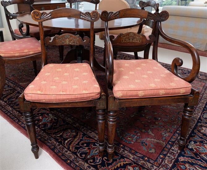 A set of Regency style dining chairs with brass inlay...