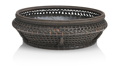 A shallow woven bamboo basket and mat