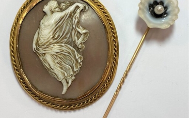 A shell cameo brooch and a banded agate and pearl set stick pin