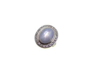 A star sapphire and diamond cluster ring