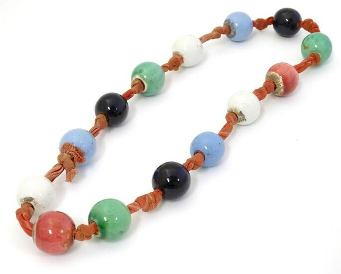 A vintage necklace of ceramic beads. Approx 24'' long