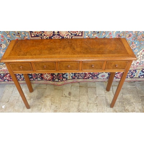 A walnut five drawer hall table, 78cm tall x 107cm x 30cm - ...