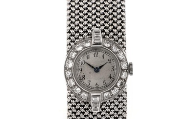 A wristwatch of platinum, diamonds and 9k white gold. Mechanical movement with...
