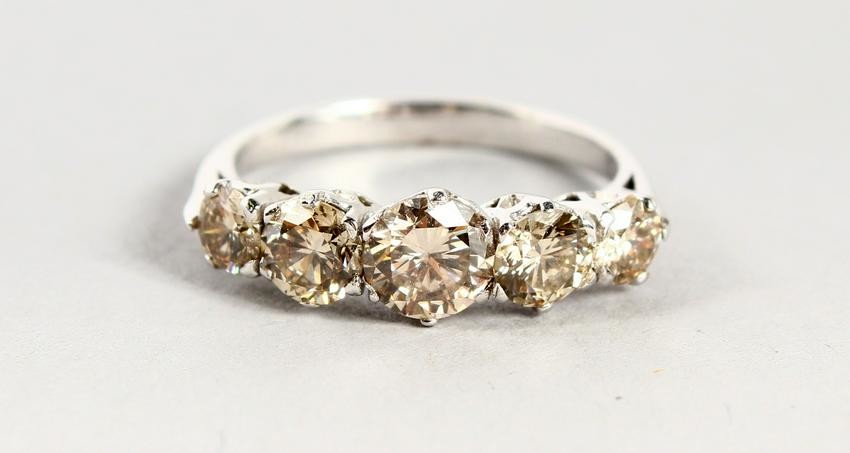 AN 18CT WHITE GOLD FIVE STONE DIAMOND RING of 1.94cts.