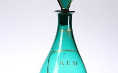 AN EARLY 19TH CENTURY GREEN GLASS RUM DECANTER, with