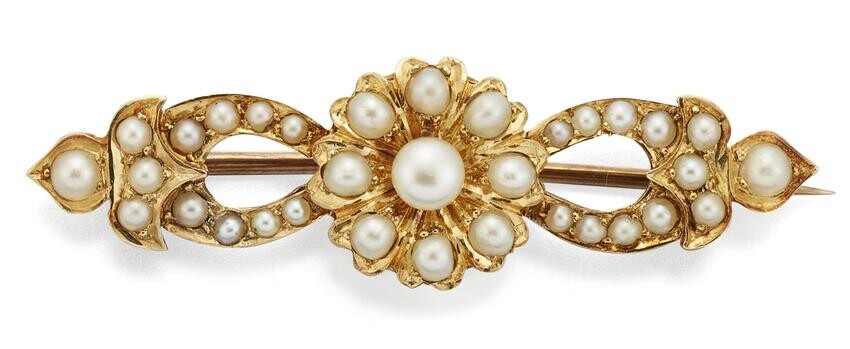AN EDWARDIAN SEED PEARL BROOCH, the central seed pearl