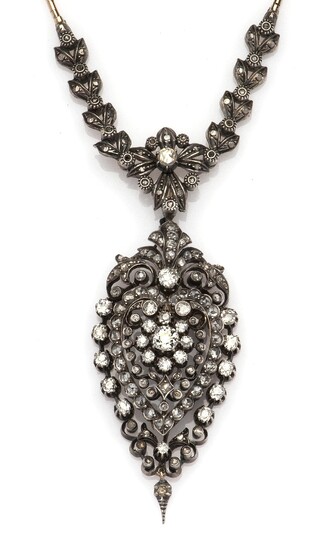 An 18k gold and silver diamond necklace