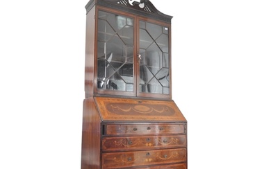 An 18th century walnut and marquetry inlaid bureau bookcase....