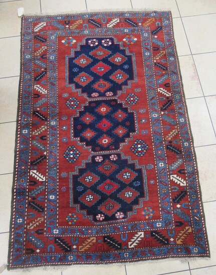 An Armenian Kazak rug, 232 x 146cmFraying to the edges and the tassels. Minor inconsistencies in the