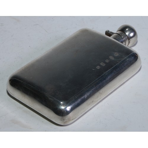 An Elizabeth II silver rounded rectangular hip flask, quite ...