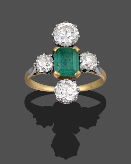 An Emerald and Diamond Ring, the emerald-cut emerald in yellow claws, flanked by an old cut diamond