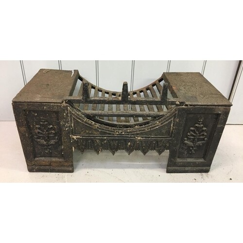 An antique cast-iron Fire Grate. Dimensions(cm) H 33 W63 D31