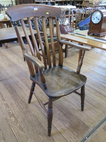 An ash and elm rail back kitchen armchair, with ring turned ...