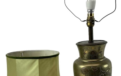An early 20th century Japanese brass table lamp decorated with...