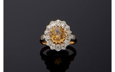 Bague "margueritte" en or jaune 18 carats (750/000), platine (950/000), diamants et saphir synthétique de...