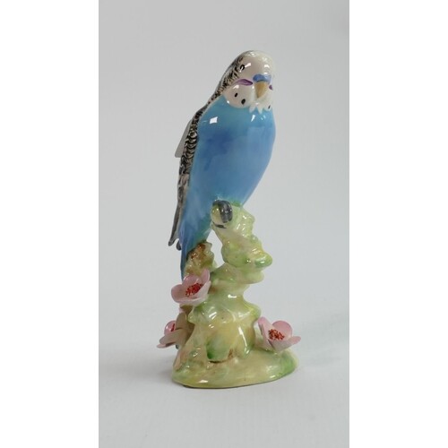 Beswick blue budgie on floral base 1217: (chip to petal edge...
