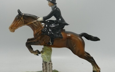 Beswick model of lady side saddle on jumping horse Model no....