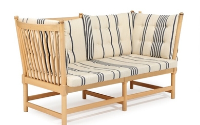 Børge Mogensen: “The spoke-back sofa”. Two-seater sofa with beech frame, loose cushions with striped wool. Manufactured by Fritz Hansen. L. 160 cm.