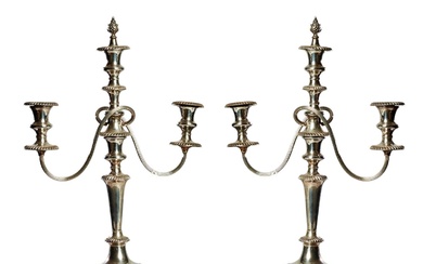 British 20th Century A pair of silver plate candelabra...