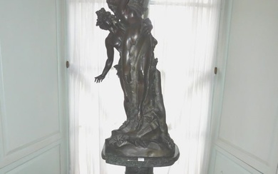 Bronze sculpture on marble pedestal