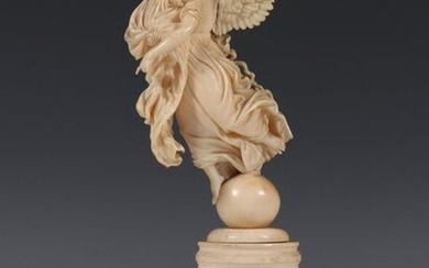 Deep, beautifully carved ivory sculpture depicting an angel...