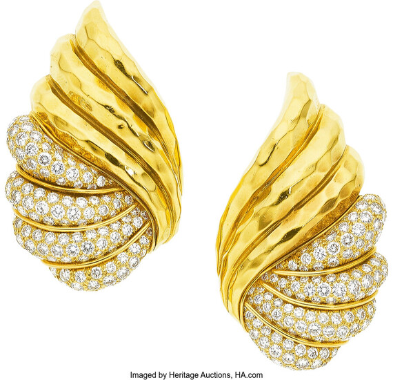 Diamond, Gold Earrings The earrings feature full-cut diamonds weighing...