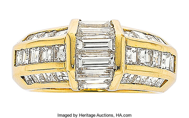 Diamond, Gold Ring The band features baguette and square...