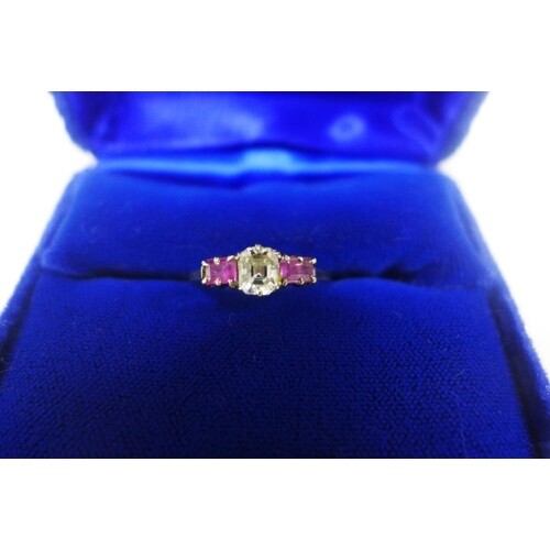 Diamond and pink sapphire dress ring, claw set with a single...