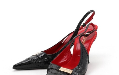 Dolce & Gabbana A pair of stilettos of black snakeskin with pointed...
