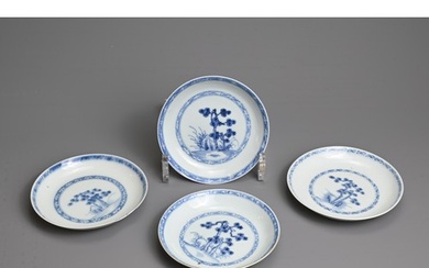 FOUR CHINESE BLUE AND WHITE PORCELAIN SAUCERS, 18TH CENTURY....
