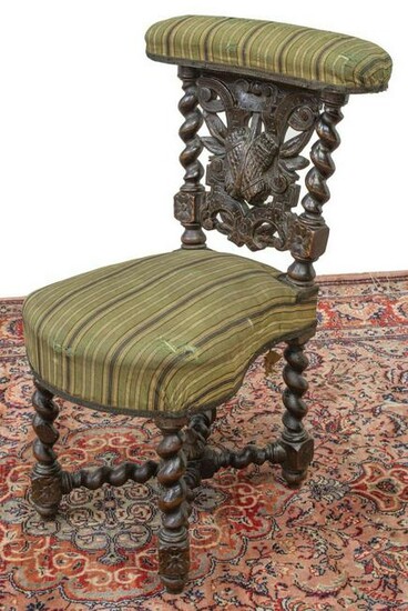 FRENCH CARVED OAK CIGAR CHAIR