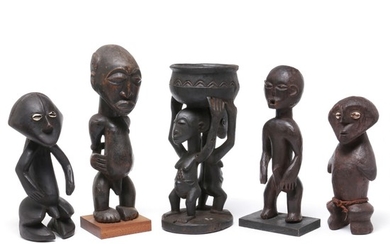 Five figures of carved patinated wood, one with kaori shell inlay. Zande, Luba and Hemba style. H. 28–39 cm. (5)