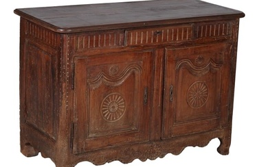 French Provincial Normandy Style Sideboard, 18th c., the molded shaped later top, over a central