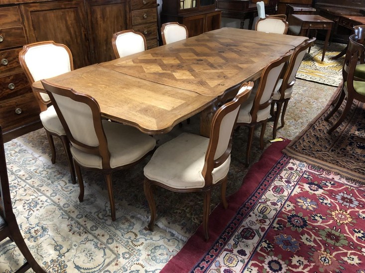 French oak serpentine shaped extending dining table with par...