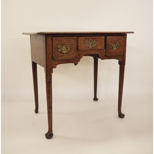 Georgian-style oak lowboy, the rectangular top with moulded ...